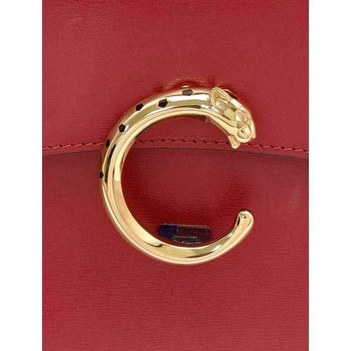 104 - A Panthère de Cartier Handbag. Crafted from poppy red calfskin leather with gold-toned hardware. Fea... 