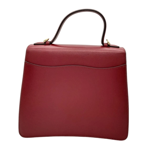 104 - A Panthère de Cartier Handbag. Crafted from poppy red calfskin leather with gold-toned hardware. Fea... 