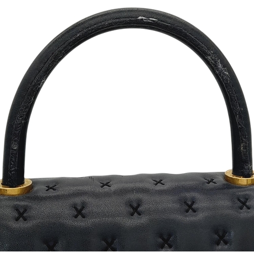 201 - A Chanel Lambskin Cross Stitch Coco Handle Flap Bag. Dark blue lambskin leather exterior with X-patt... 