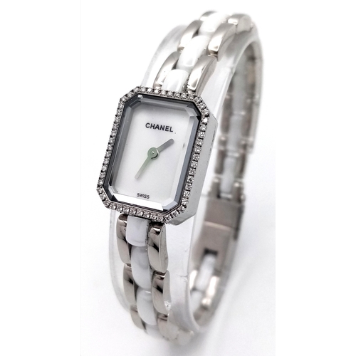 309 - A Chanel Premiere Diamond Quartz Ladies Watch. Stainless steel and white ceramic bracelet. Stainless... 