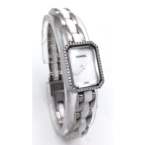 309 - A Chanel Premiere Diamond Quartz Ladies Watch. Stainless steel and white ceramic bracelet. Stainless... 