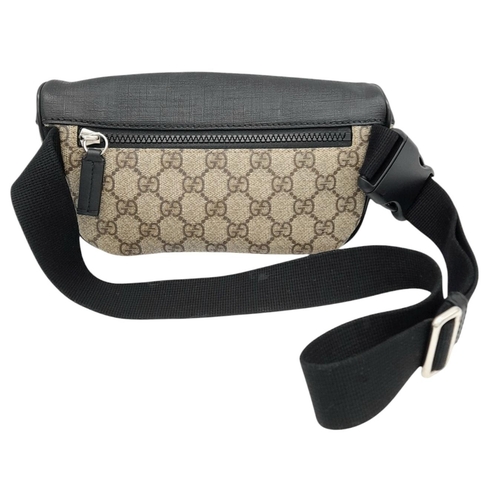 349 - A Gucci GG Supreme Eden Belt Bag. Grey GG monogram leather exterior with black leather trim and silv... 