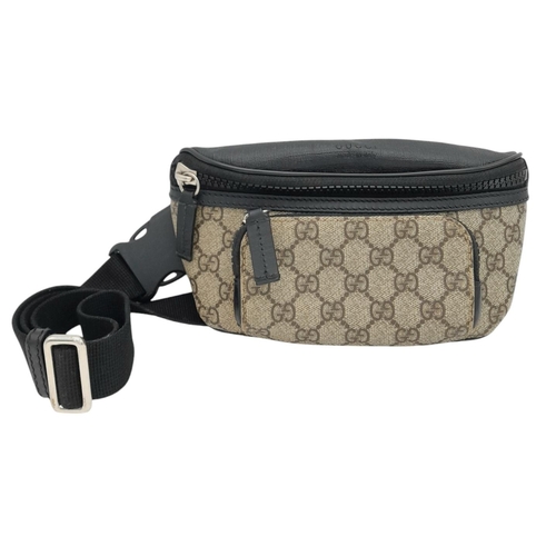 349 - A Gucci GG Supreme Eden Belt Bag. Grey GG monogram leather exterior with black leather trim and silv... 