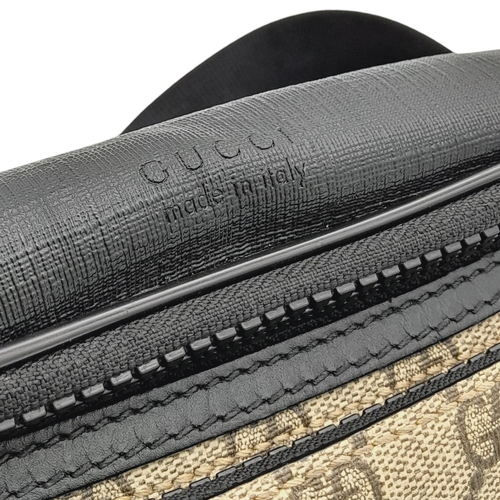 349 - A Gucci GG Supreme Eden Belt Bag. Grey GG monogram leather exterior with black leather trim and silv... 