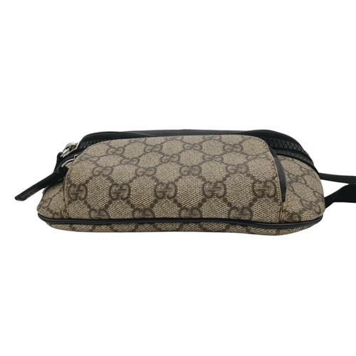 349 - A Gucci GG Supreme Eden Belt Bag. Grey GG monogram leather exterior with black leather trim and silv... 