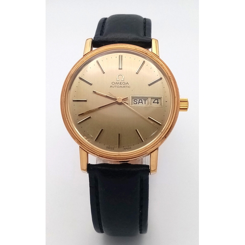 356 - A Vintage Omega Automatic Gents Watch. Model 1660209. Black leather strap. Gilded case - 36mm. Gold ... 