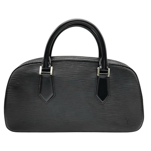 377 - A Louis Vuitton Black Epi Leather Alma PM Bag. Black leather exterior with silver-toned hardware, du... 