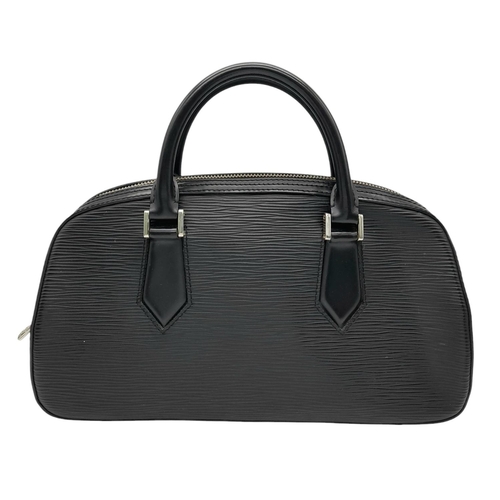 377 - A Louis Vuitton Black Epi Leather Alma PM Bag. Black leather exterior with silver-toned hardware, du... 