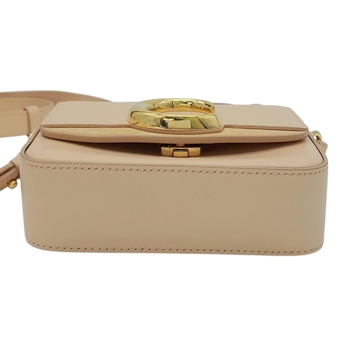 476 - A Chloé Pink C Crossbody Bag. Pink calf leather exterior with a beige suede panel near the gold-tone... 