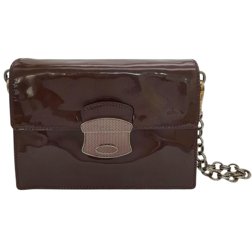 490 - A Prada Vernice Sound Bag. Glossy brown leather exterior, silver-tone hardware, features a detachabl... 