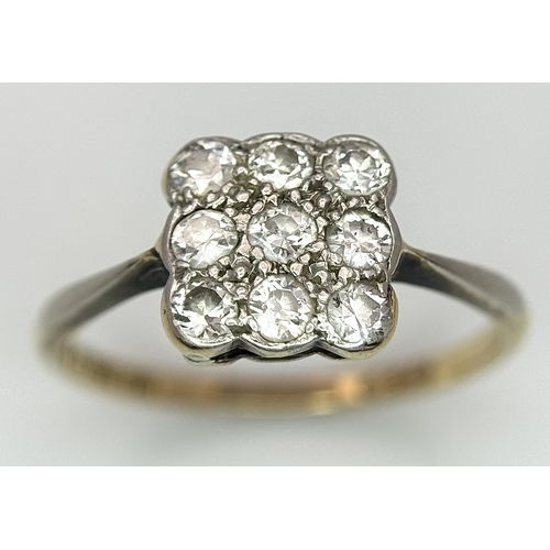 504 - An 18K Yellow Gold, Platinum and Diamond Art Deco Ring. Nine old cut diamonds in a square formation.... 