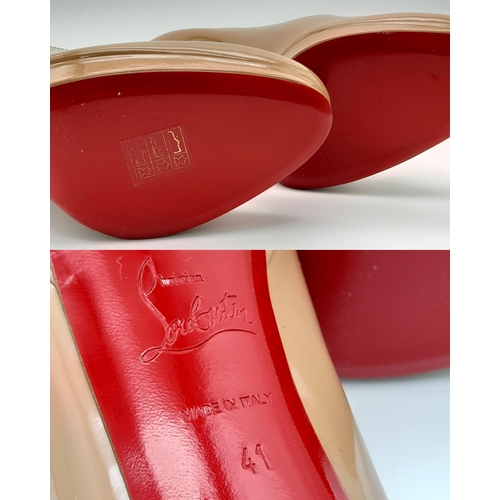 525 - A Pair of Christian Louboutin Stiletto Heels. Crafted from glossy beige patent leather with an iconi... 