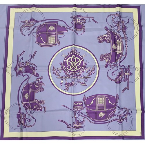 685 - A Hermès Ex Libris Purple Silk Scarf featuring a striking design of horse carriages in purple and iv... 