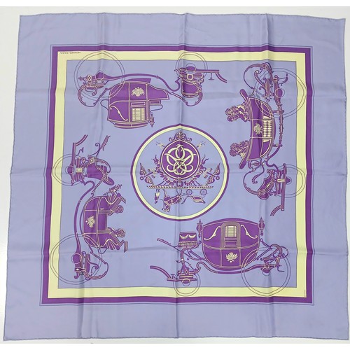 685 - A Hermès Ex Libris Purple Silk Scarf featuring a striking design of horse carriages in purple and iv... 