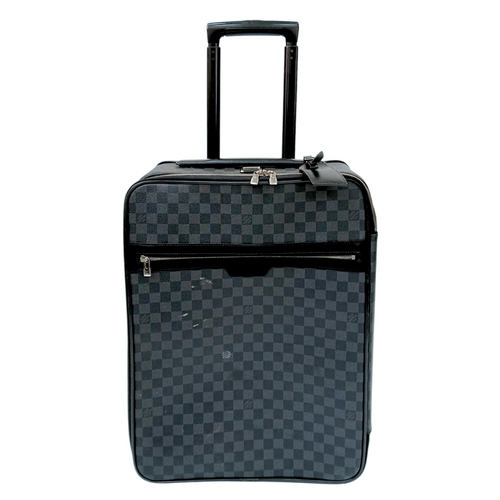 769 - A Louis Vuitton Damier Graphite Pegase Suitcase. Coated canvas exterior with leather trim, ID tag an... 