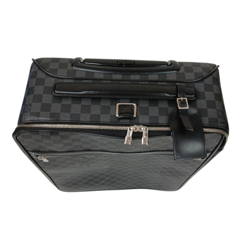 769 - A Louis Vuitton Damier Graphite Pegase Suitcase. Coated canvas exterior with leather trim, ID tag an... 