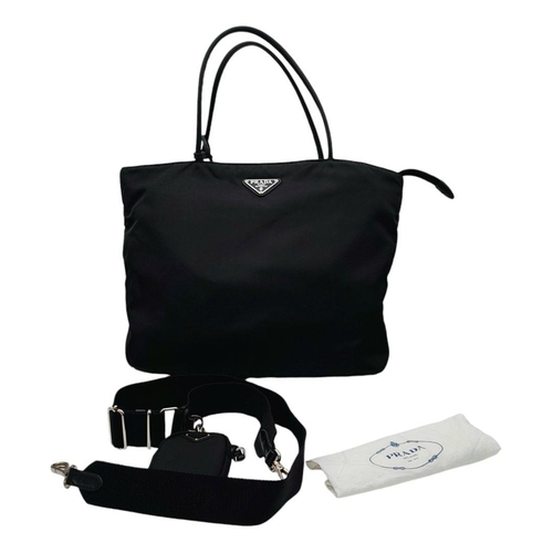 776 - A Prada Black Nylon Tote Bag. Prada badge exterior. Textile interior with zipped and open compartmen... 