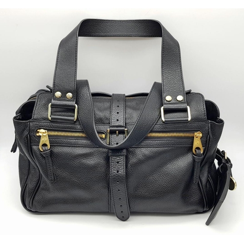 798 - A Mulberry Black Mabel Satchel Bag. Black leather exterior with gold-toned hardware and dual leather... 