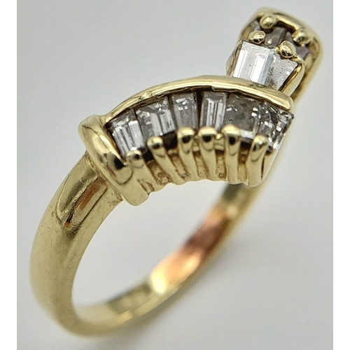 840 - A 14K Yellow Gold Tapered Baguette Diamond Ring. Chevron form with ten tapered diamonds. Size M. 4g ... 