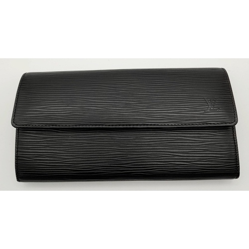 875 - A Louis Vuitton Black Epi Leather Sarah Wallet. Black Epi leather exterior with silver-toned hardwar... 