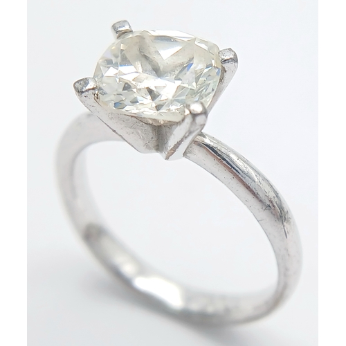 1636 - A Silver Large White Stone Dress Ring.