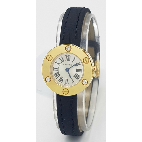 137 - A Cartier Leve 18K Gold Cased and Diamond Watch. Black leather strap. 18K gold case with 3 diamond b... 