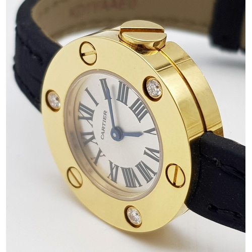 137 - A Cartier Leve 18K Gold Cased and Diamond Watch. Black leather strap. 18K gold case with 3 diamond b... 