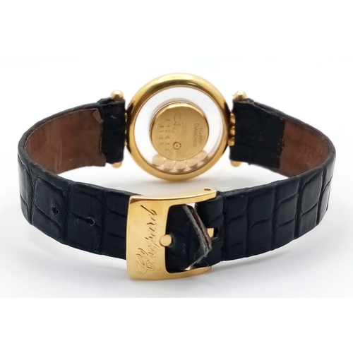 184 - A Chopard Happy Diamonds 18K Gold Quartz Ladies Watch. Black leather strap. 18K gold case - 26mm. Wh... 