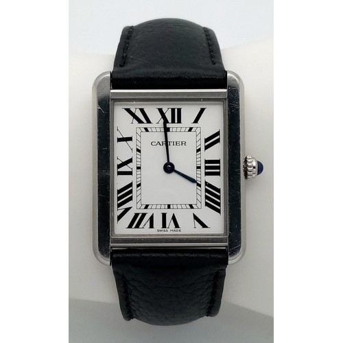 395 - A Cartier Tank Quartz Gents Watch. Black leather strap. Stainless steel case - 28mm. White dial with... 