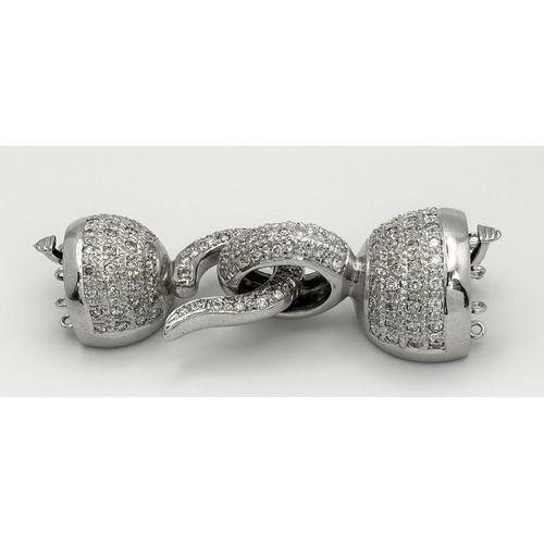 652 - A Fancy 14K White Gold and Diamond Encrusted Six Row Necklace Clasp. 23.3g total weight.