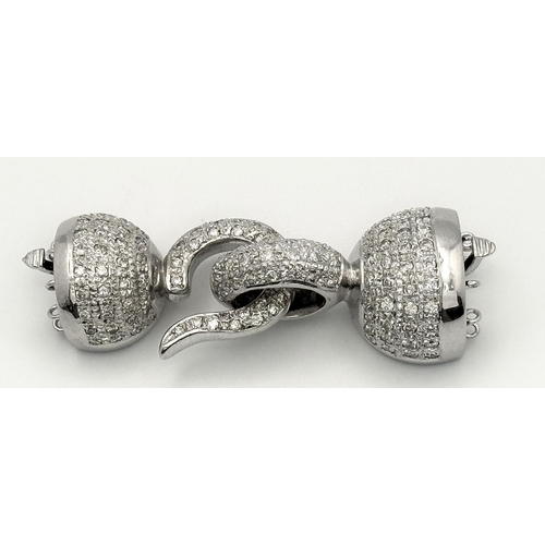 652 - A Fancy 14K White Gold and Diamond Encrusted Six Row Necklace Clasp. 23.3g total weight.