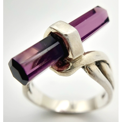 1517 - A Vintage Celtic Design Sterling Silver and Pencil Cut Amethyst Ring Size N. The Ring is set with a ... 