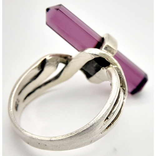 1517 - A Vintage Celtic Design Sterling Silver and Pencil Cut Amethyst Ring Size N. The Ring is set with a ... 