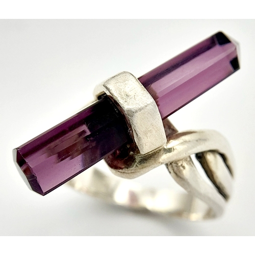 1517 - A Vintage Celtic Design Sterling Silver and Pencil Cut Amethyst Ring Size N. The Ring is set with a ... 