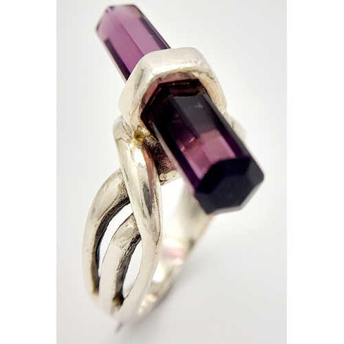 1517 - A Vintage Celtic Design Sterling Silver and Pencil Cut Amethyst Ring Size N. The Ring is set with a ... 