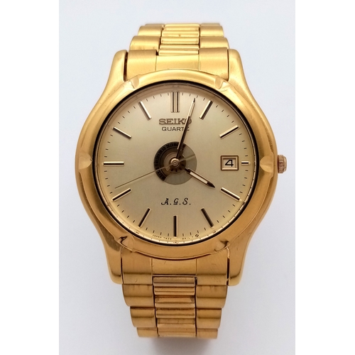 16 - An Interesting Vintage Seiko Quartz AGS Gents Watch. Model 7M22. Gold plated bracelet and case - 38m... 