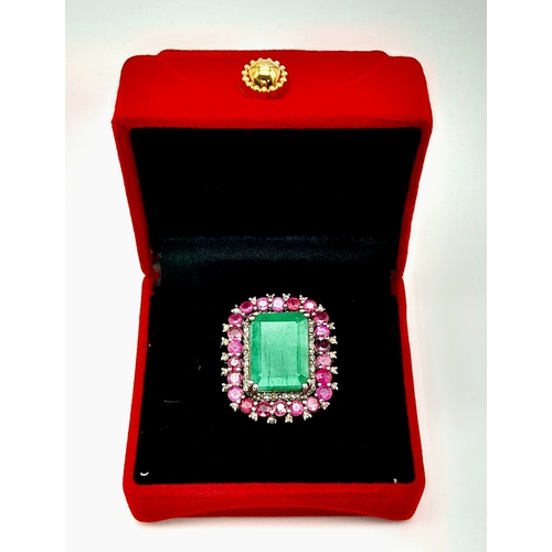 163 - An Emerald, Ruby and Diamond Dress Ring. Set in 925 Silver. Ruby weight 3ctw, emerald weight 10ct. D... 