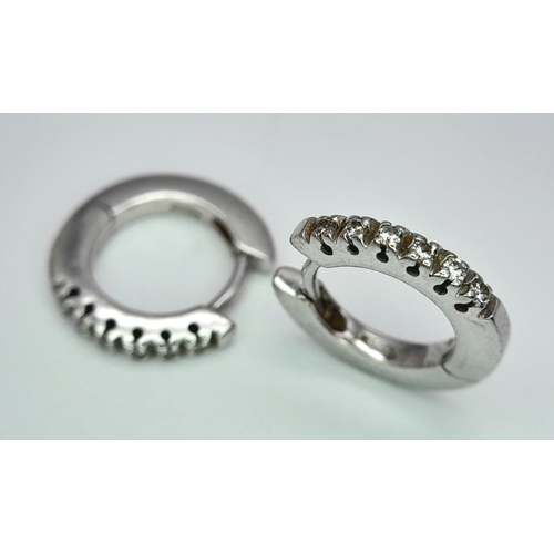 184 - A PAIR OF 18K WHITE GOLD DIAMOND SET MINI HOOP EARRINGS 2.8G , APPROX 1.3CM DIAMETER. Ref: SC 3074