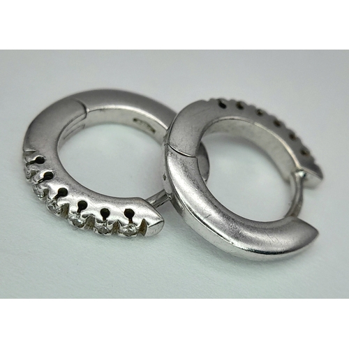 184 - A PAIR OF 18K WHITE GOLD DIAMOND SET MINI HOOP EARRINGS 2.8G , APPROX 1.3CM DIAMETER. Ref: SC 3074