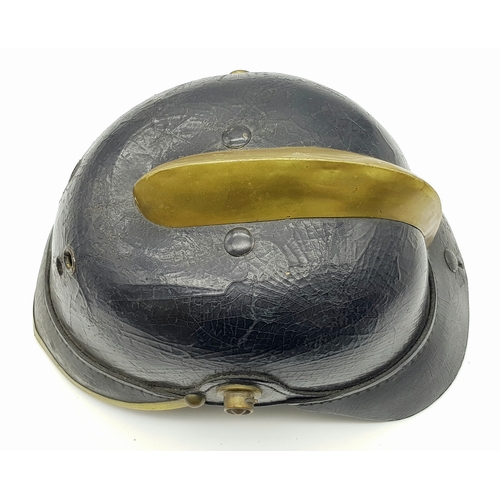 197 - An Unusual Imperial German Fire Helmet. A standard 1915 Pattern Army Pickelhaube Marked to the 19th ... 