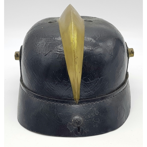 197 - An Unusual Imperial German Fire Helmet. A standard 1915 Pattern Army Pickelhaube Marked to the 19th ... 