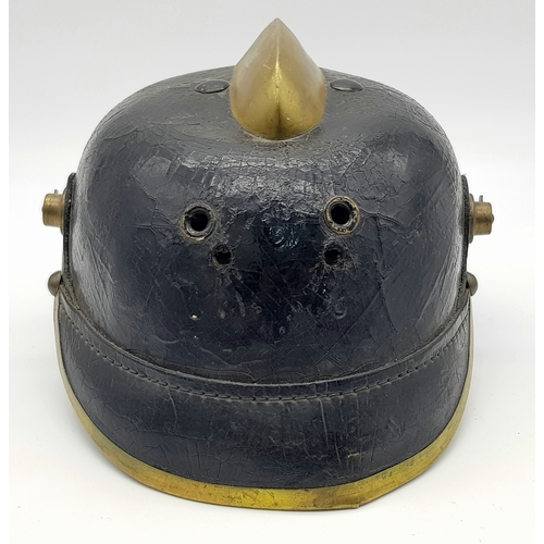 197 - An Unusual Imperial German Fire Helmet. A standard 1915 Pattern Army Pickelhaube Marked to the 19th ... 