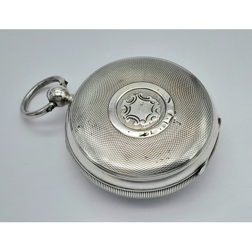 37 - An Antique Sterling Silver Pocket Watch. Hallmarks for London 1907. White dial with second sub dial.... 