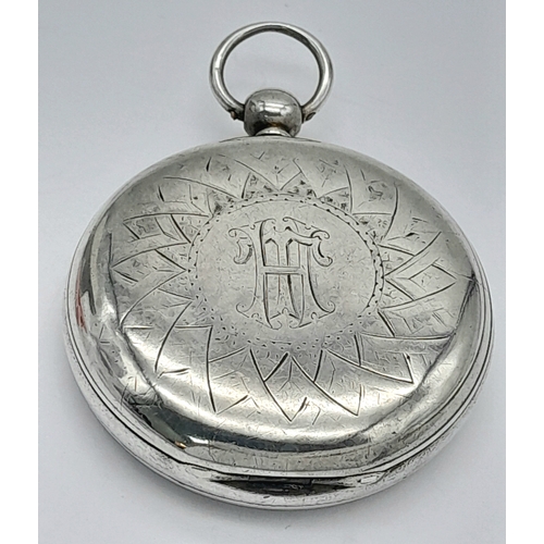 79 - An Antique Sterling Silver Cased Pocket Watch. Hallmarks for London 1875. White dial with second sub... 