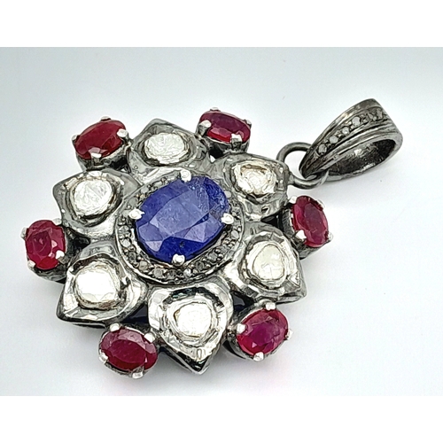 892 - A Ruby, Sapphire and Old Cut Diamond Pendant. Set in 925 Silver. Rubies - 3ctw. Sapphire - 2ct.  Dia... 