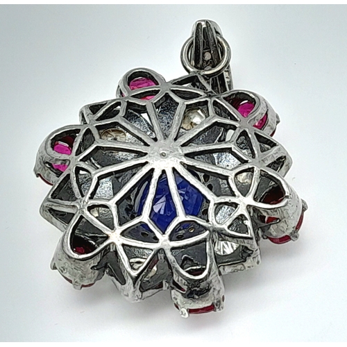 892 - A Ruby, Sapphire and Old Cut Diamond Pendant. Set in 925 Silver. Rubies - 3ctw. Sapphire - 2ct.  Dia... 