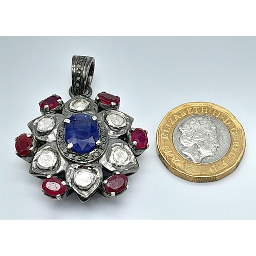 892 - A Ruby, Sapphire and Old Cut Diamond Pendant. Set in 925 Silver. Rubies - 3ctw. Sapphire - 2ct.  Dia... 