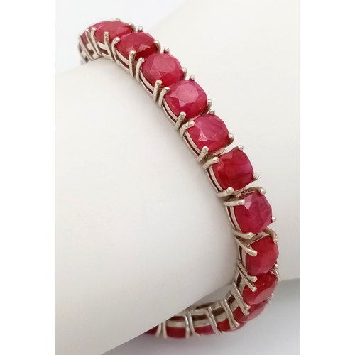 897 - A Ruby Gemstone Tennis Bracelet - Set in 925 Silver. 18cm. Cd-1692.