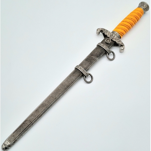 34 - A 3rd Reich Heer (Army) Officers Dagger. Very nice Unmarked late War example with pumpkin coloured g... 