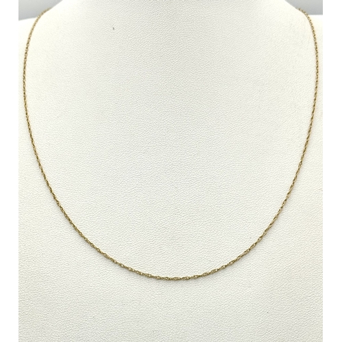 1634 - A 9K Yellow Gold Disappearing Necklace. 44cm. 0.65g